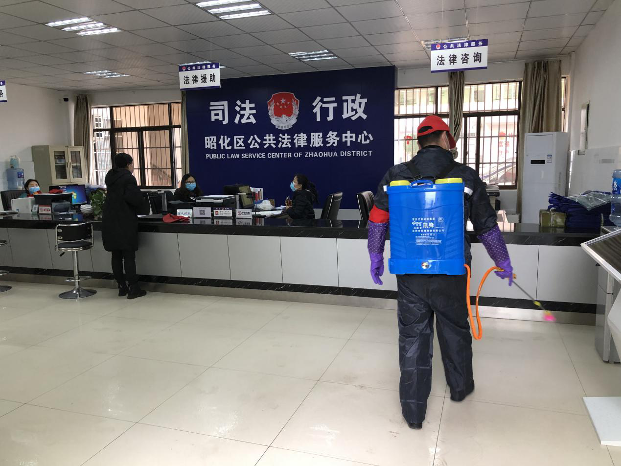 区司法局强化责任担当    党员志愿服务队在行动